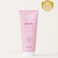 Shampoing Luxéol spécialement conçu pour nettoyer et prendre soin des cheveux bouclés.
